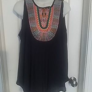 Beautiful navy top what embroidered tribal front